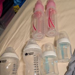 Like New Lots Of Baby Bottles Only Used 1 Time .