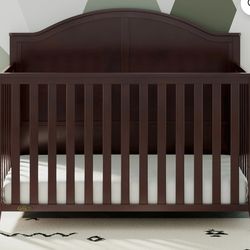 Cherrywood graco baby crib/ toddler bed