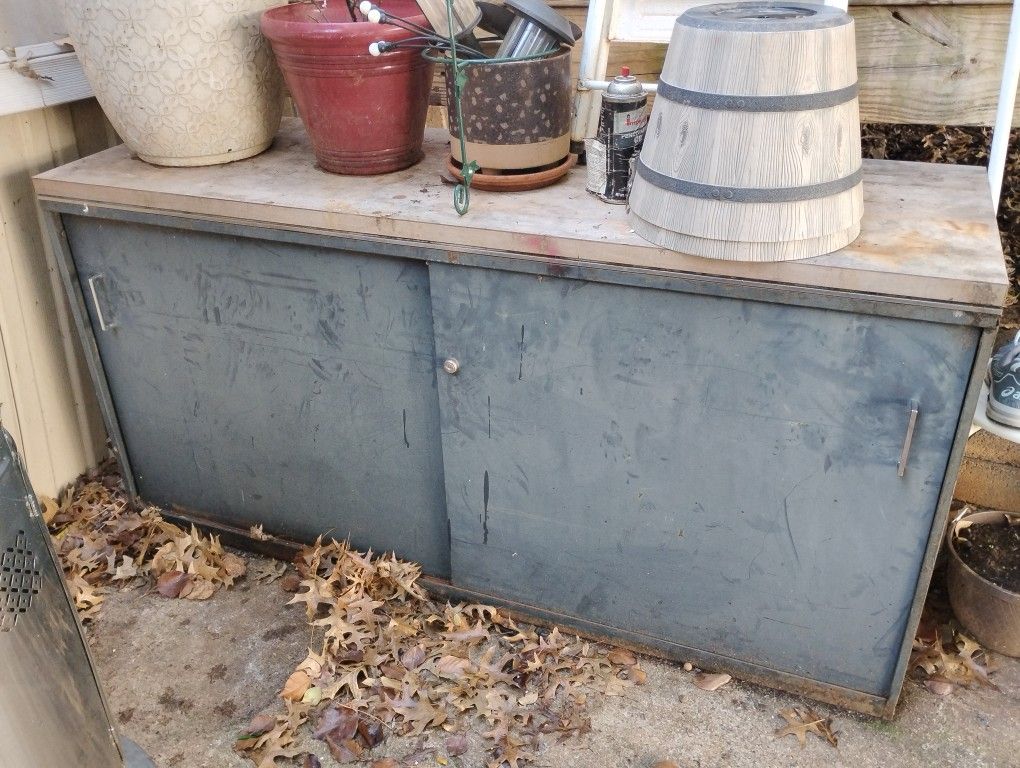Old Metal Outdoor Storage Desk With Sliding Doors