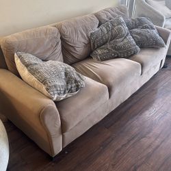 Two Circular Couches And A Main Couch 