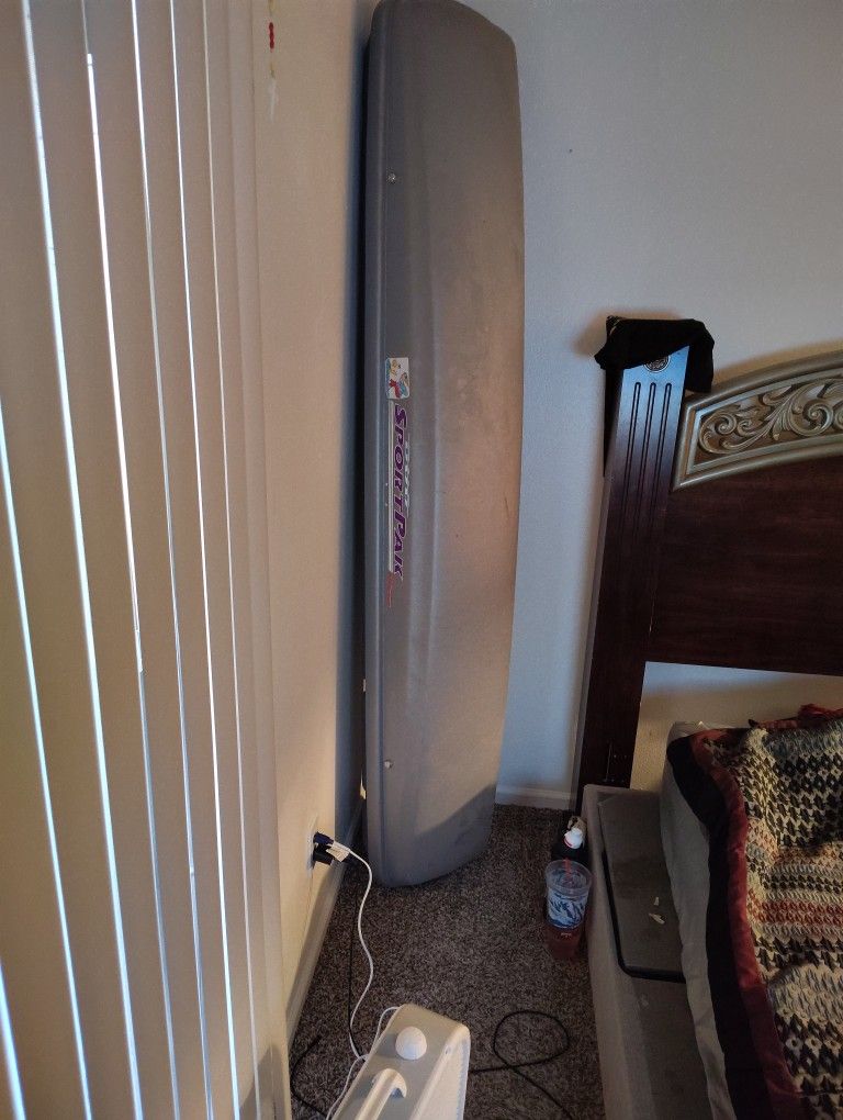 Cargo Carrier For Vehicle With A Roof Rack