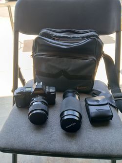 Canon T70 Camera With Telephoto Lens
