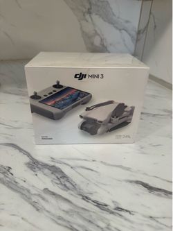 DJI Mini 3 Drone w/ DJI RC Controller