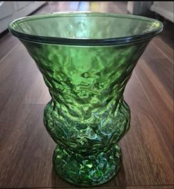 This vintage E.O. Brody Co. crinkle glass vase is a collectible item.     Brand: E.O. Brody Co. Color: Emerald green Texture: Crinkled or textured gla