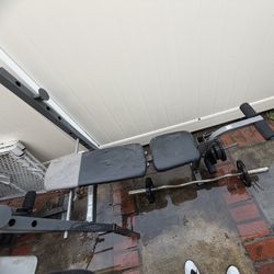 Weight Bench And ez grip olympic barbell with Weights