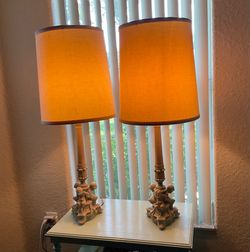 Gorgeous set of Vintage Large lamps.  34” each.  Nice condition.  Cherub base