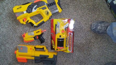 4 Nerf guns. New or like new