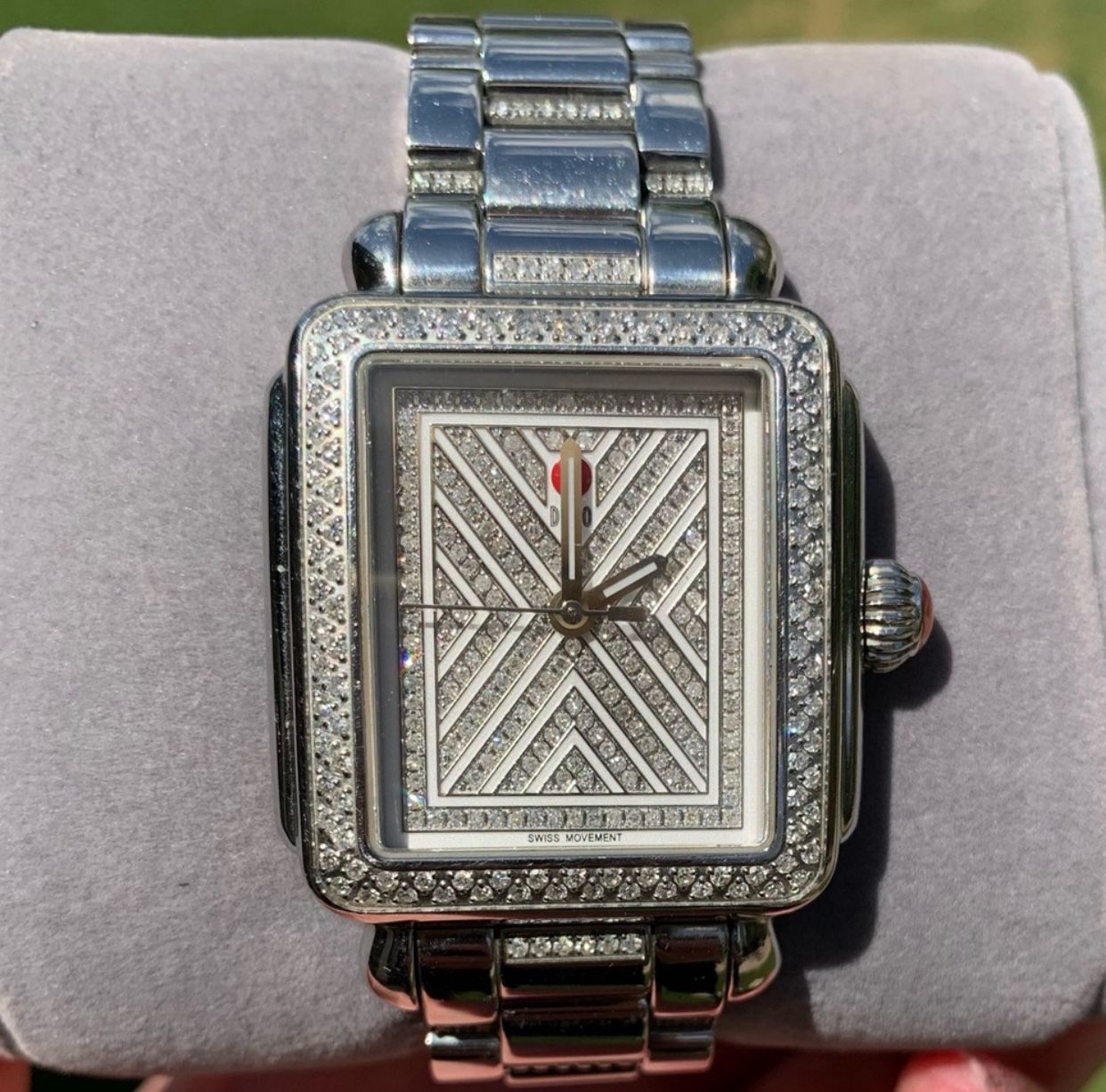 Michele Deco limited edition, diamond watch and diamond band. This elegant timepiece features a sleek silver design, perfect for any occasion. Experie