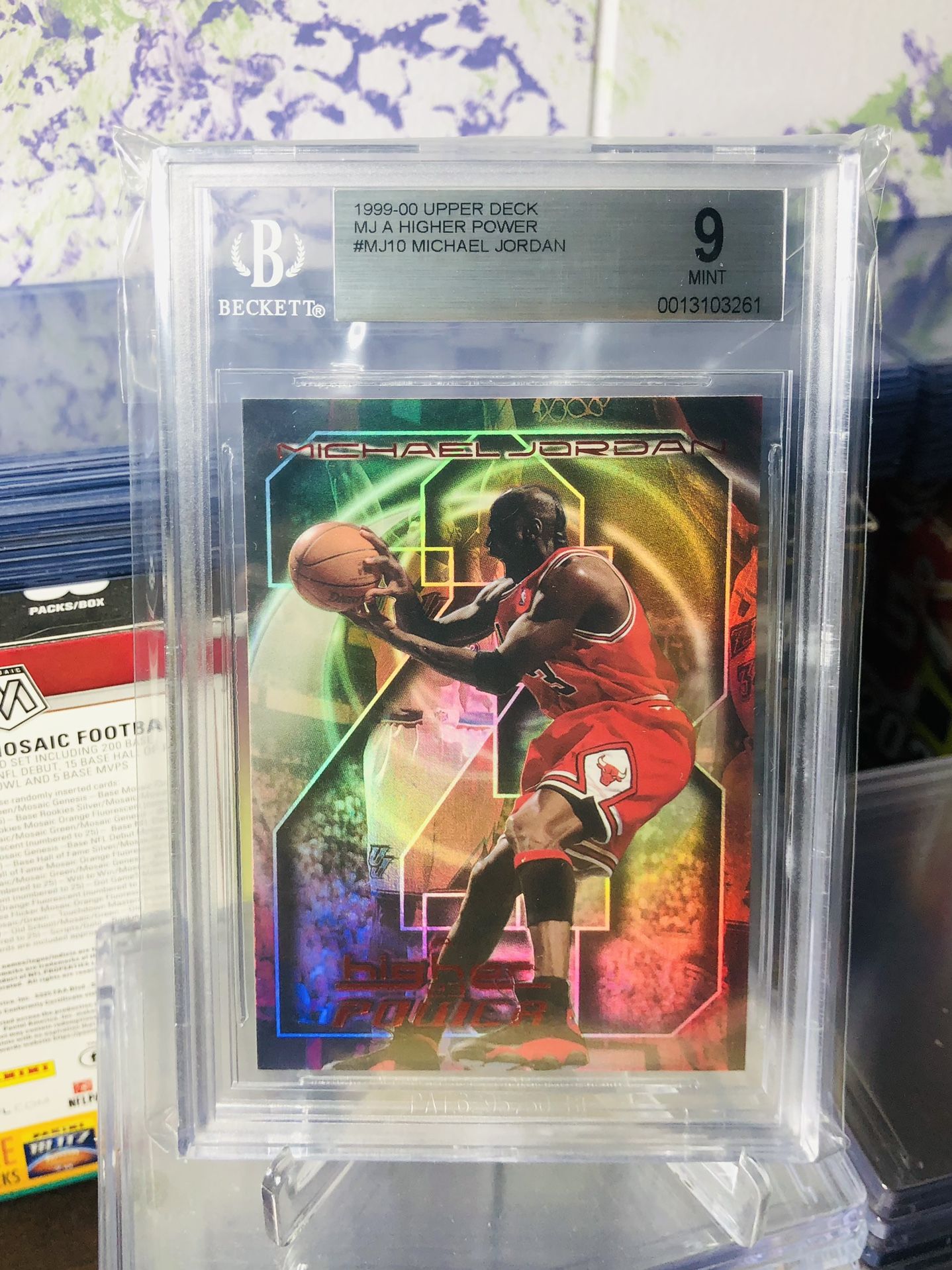 1999 Upper Deck MJ A Higher Power Refractive Card graded 9 by Beckett