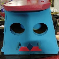 Robot Looking Birdhouse