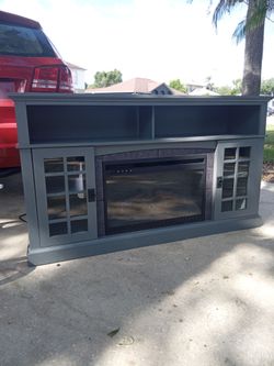 Entertainment stand with fireplace