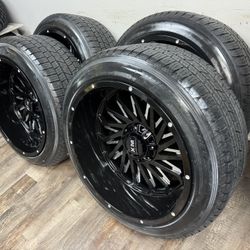 NEW 22x12 gloss black/milled wheels wrapped in 285/45r22 tires