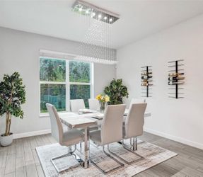 City Furniture dining room table with gray chairs