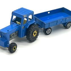 Matchbox 900 TP-11 a Ford Tractor and hay trailer the color is blue from 1978.