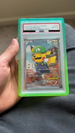 2016 Pikachu Luigi Poncho PSA 8
