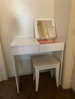 White vanity with stool