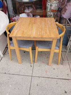 light wood table and chair set