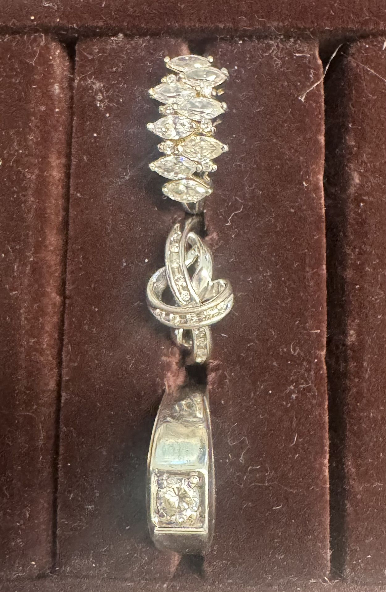 Several Silver Rings and a Coach Bracelet all Rings are size 9