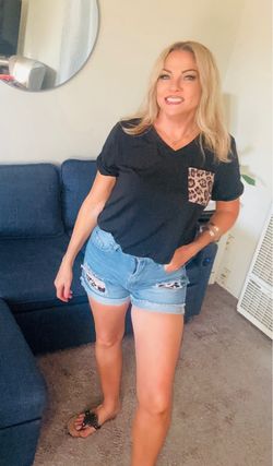 Black V-Neck Top with Leopard Print Pocket.  Shorts included.