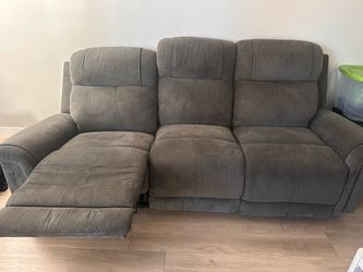 Dark Gray recliner and loveseat