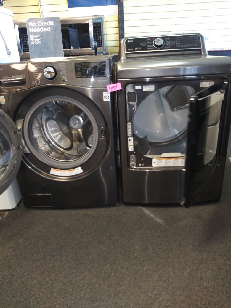 LG new scratch and dent Front load washer and used electric dryer in great condition