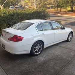 2013 Infiniti G37 with 117,000 miles. 