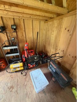 Ariens snowblower, toro push mower, Remington kerosene heater, compressor, metal stand