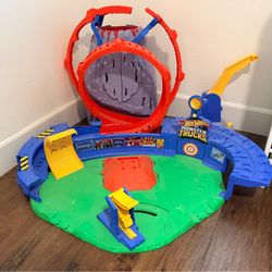 Hot wheels monster truck with dinosaur track