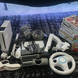 Nintendo Wii Bundle – Console, 12 Games, Wheel, Nunchuk, Mario – Works Great