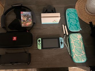 Nintendo switch (animal crossing edition) and accessories lot