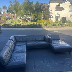 Large grey leather sectional couch 