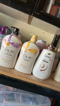 Body wash.    Olay. &. Dove.   8 each.