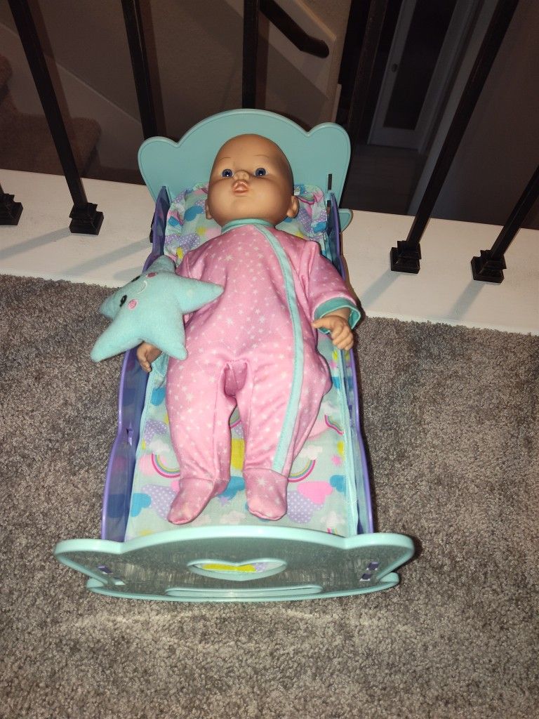 Baby doll and crib