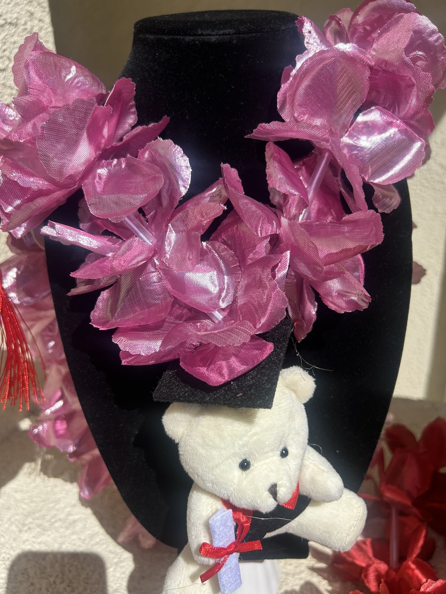 $4each One graduation leis with teddy bear