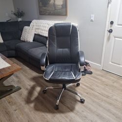 Black And White Office Chair On Wheels