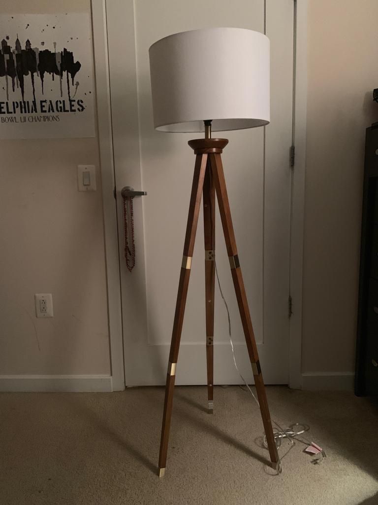 Rustic three legged modern lamp with wooden legs