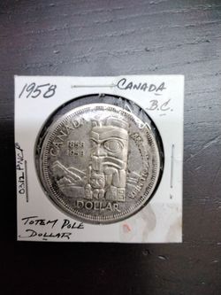 1958 Canada Totem Pole 80% Silver Dollar  $59. Very Little wear.