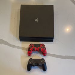 PS4 PRO With 2 Controllers And Game Lot
