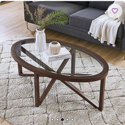 Oval Glass Top Coffee Table $250