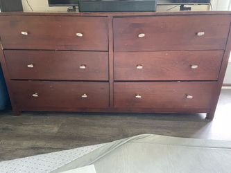 Solid wood dresser with 6 draws.