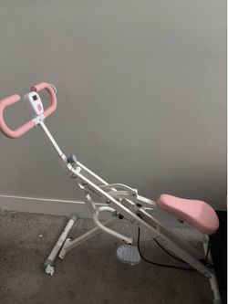 Squatting machine