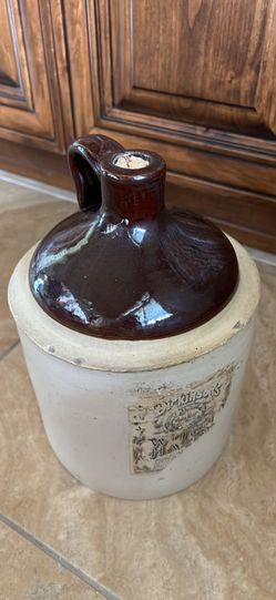Vintage 1 gallon ceramic jug made by Dirkinsons. It housed Witch Hazel.