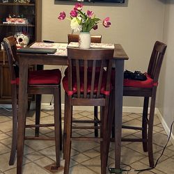 Bar table with 4 chairs - used but loved