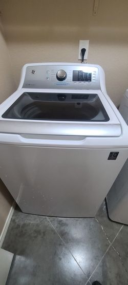 GE 4.8 cu. ft. Top Load Washer with FlexDispense