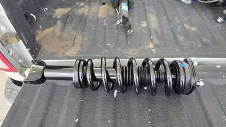 driver side lower control  arm , and strut