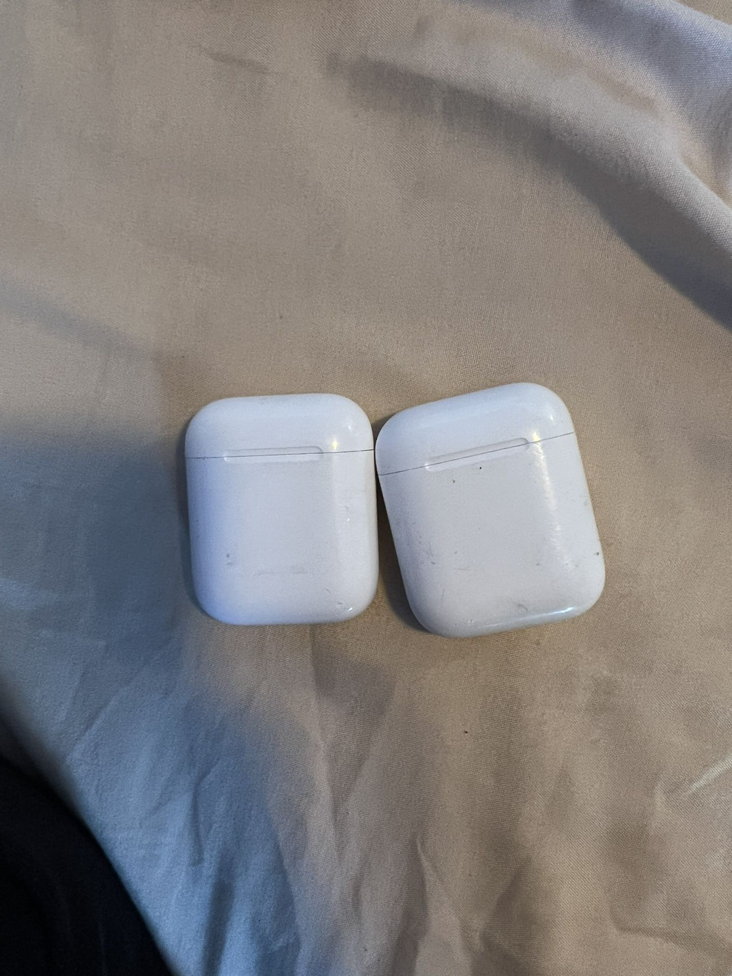 TWO AIRPOD CASES (NO HEADPHONES CASES ONLY)