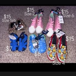 New pairs of shoes with tags , prices and sizes on picture.