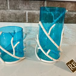 2 New beautiful coral candle holders with aqua glass. Never used. Taller holder is 10 inches tall and the smaller candle holder is 6 inches tall . $20