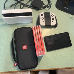 OLED Nintendo Switch w/ 4 Games
