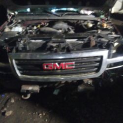 White Chevy Truck For Sale And Burgundy GMC Truck Being parted Out